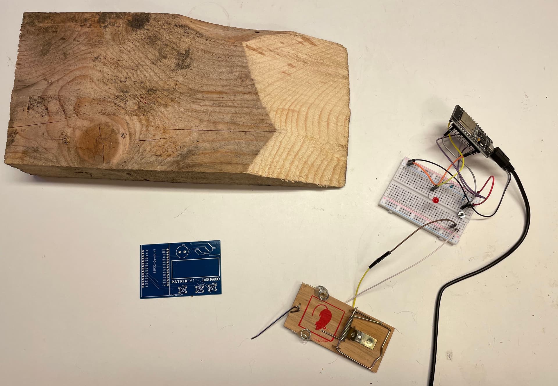 All the parts for a connected mouse trap scrambled